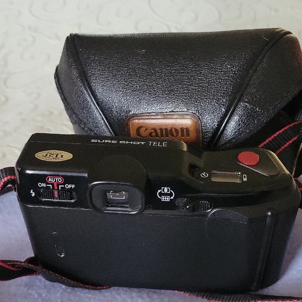 Canon Vintage Black Film Camera with Red Accents